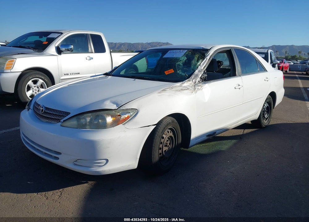 2002 TOYOTA CAMRY LE VIN: JTDBE32K720064386
