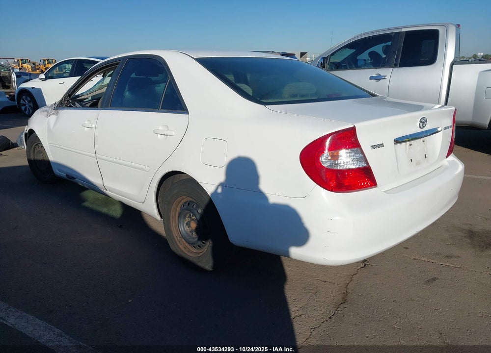 2002 TOYOTA CAMRY LE VIN: JTDBE32K720064386