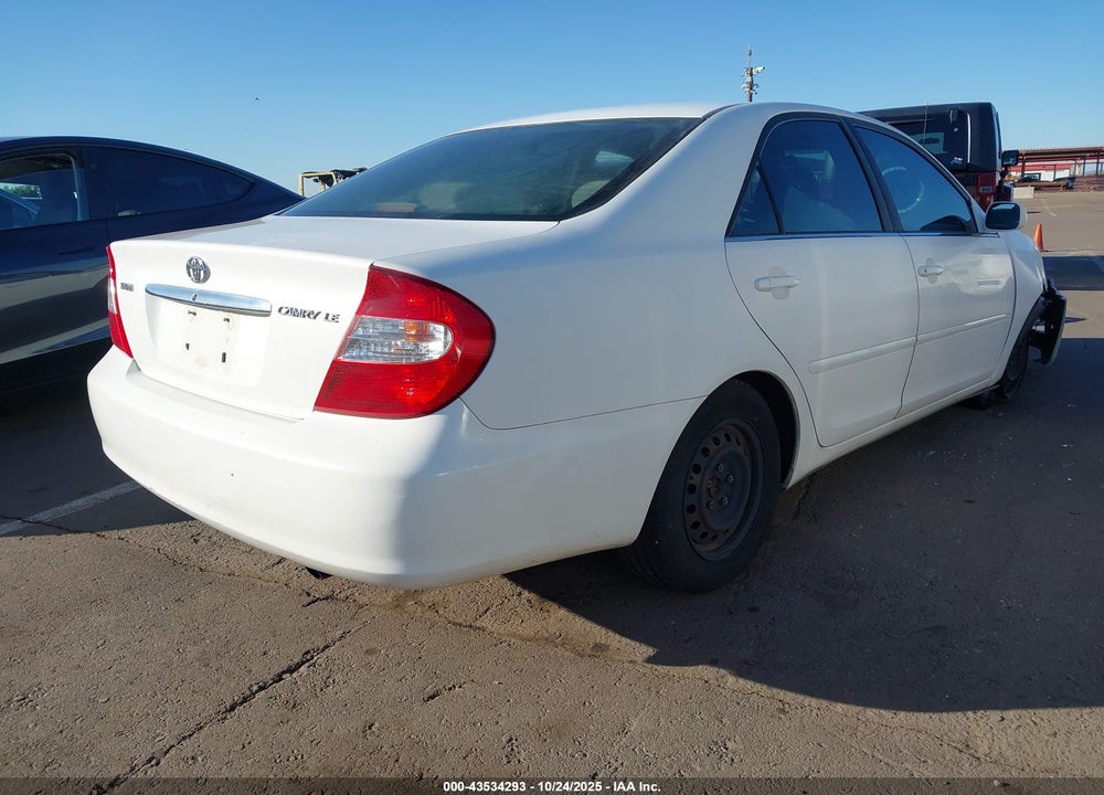 2002 TOYOTA CAMRY LE VIN: JTDBE32K720064386