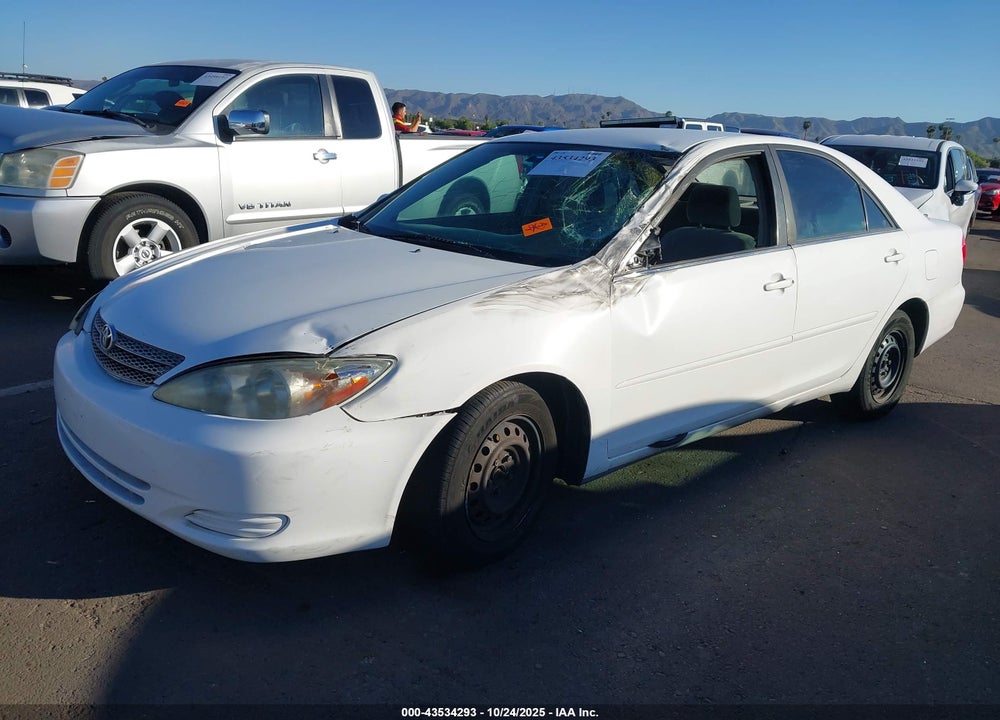 2002 TOYOTA CAMRY LE VIN: JTDBE32K720064386