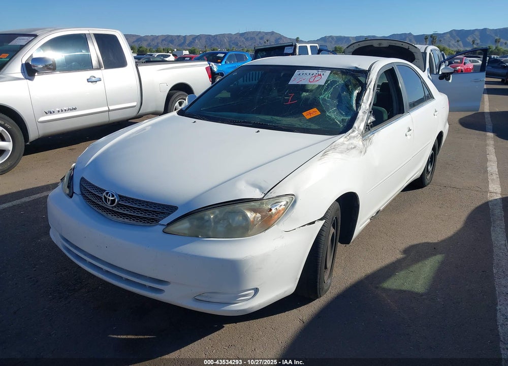 2002 TOYOTA CAMRY LE VIN: JTDBE32K720064386