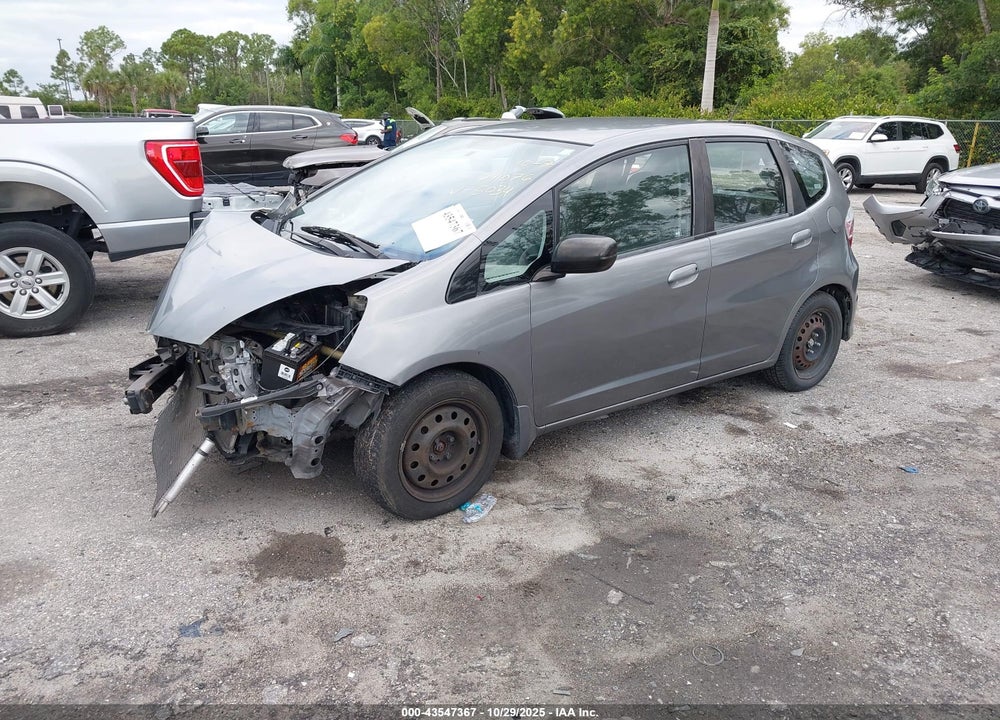 2009 HONDA FIT VIN: JHMGE88299S055034