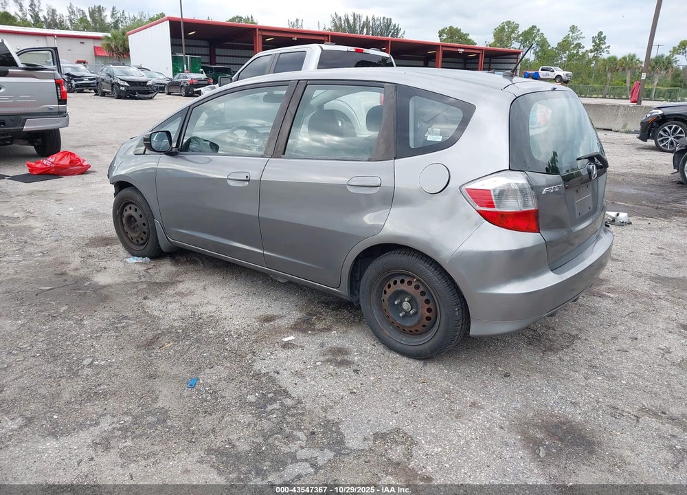 2009 HONDA FIT VIN: JHMGE88299S055034