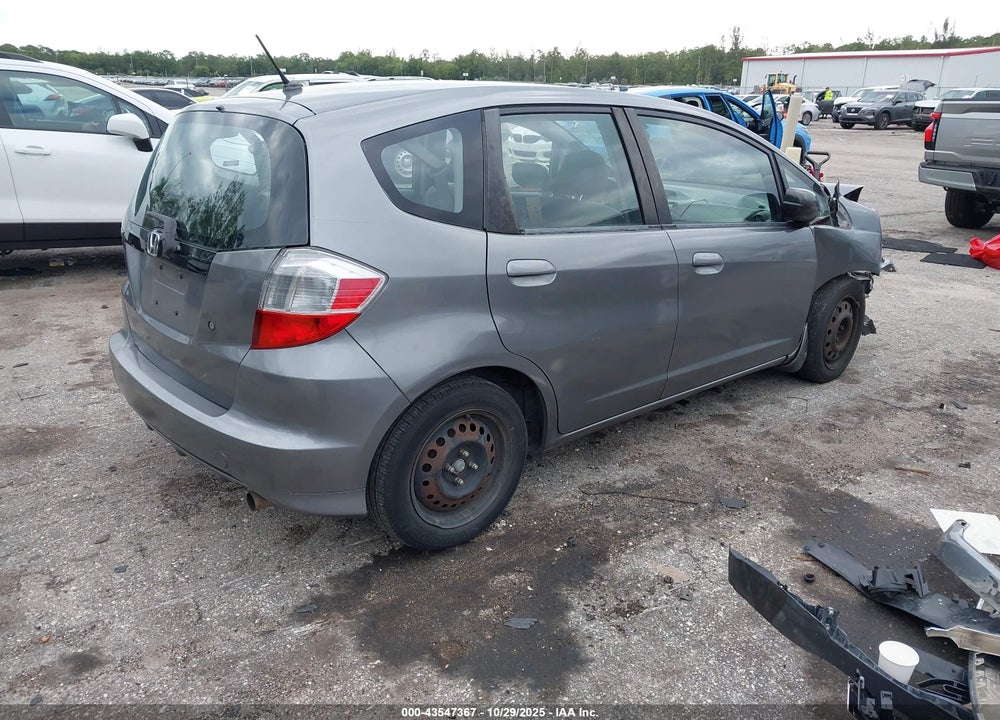 2009 HONDA FIT VIN: JHMGE88299S055034