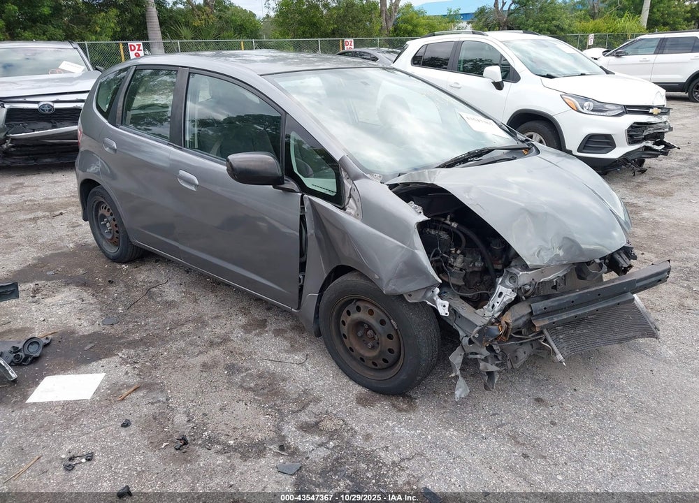 2009 HONDA FIT VIN: JHMGE88299S055034