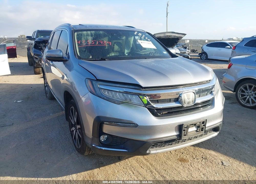 2020 HONDA PILOT 2WD TOURING 7 PASSENGER VIN: 5FNYF5H60LB000139