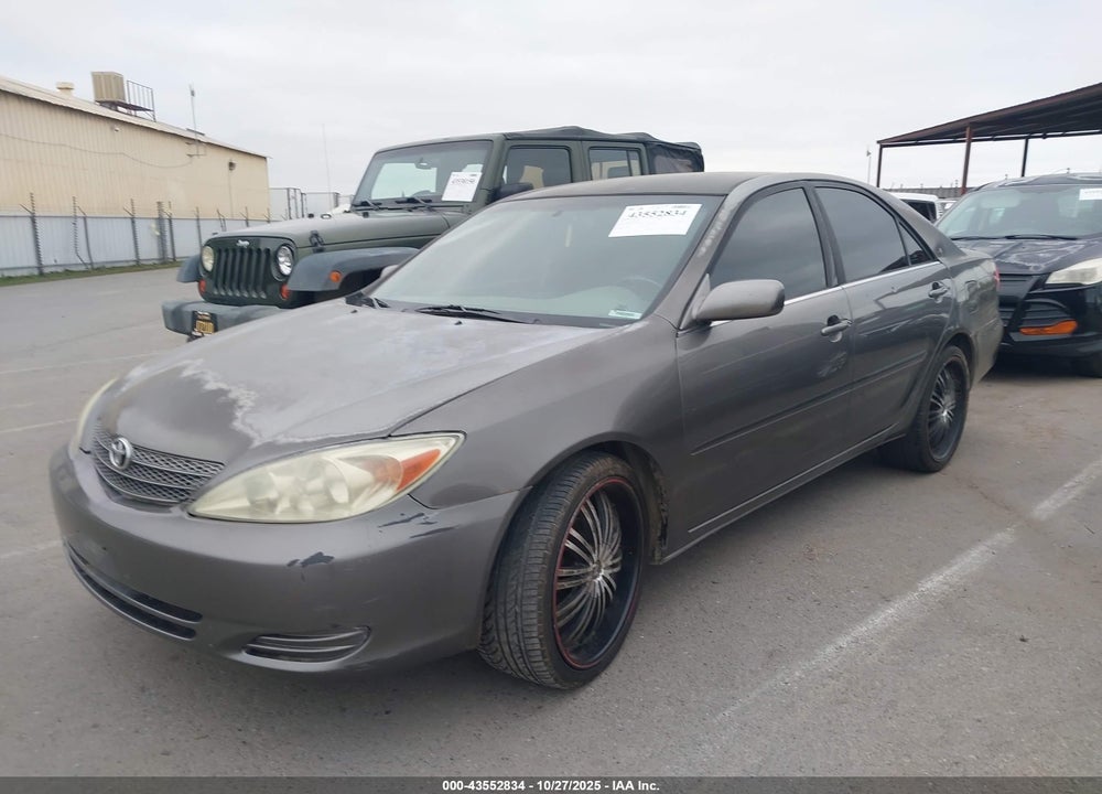 2003 TOYOTA CAMRY LE VIN: JTDBE32K130230810