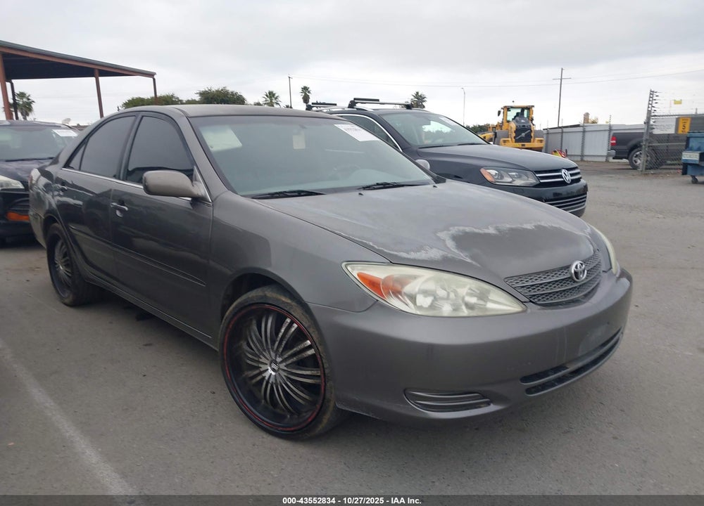 2003 TOYOTA CAMRY LE VIN: JTDBE32K130230810