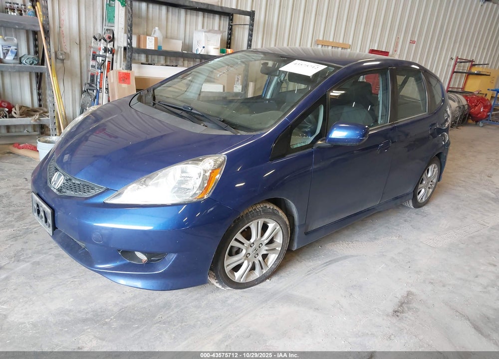 2009 HONDA FIT VIN: JHMGE88699S037085