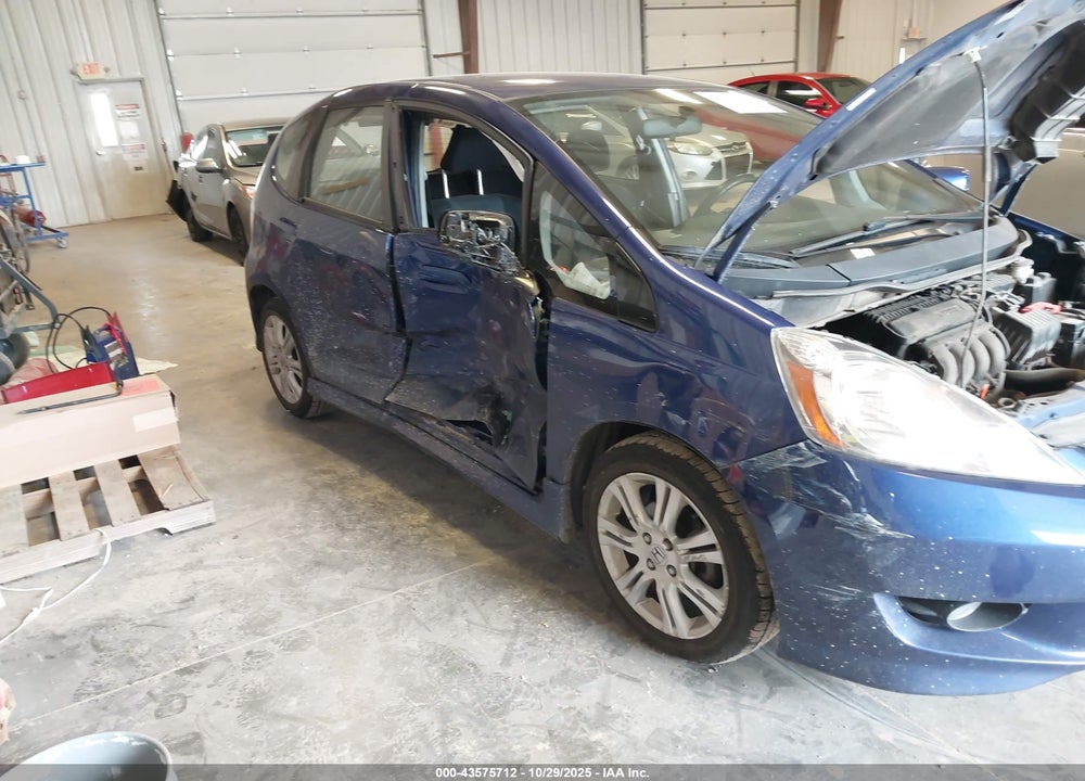 2009 HONDA FIT VIN: JHMGE88699S037085