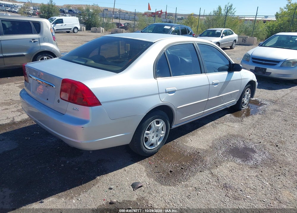 2002 HONDA CIVIC LX VIN: 1HGES16562L004095