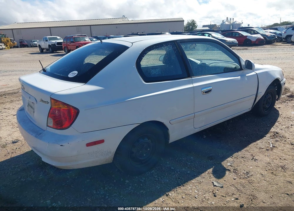2004 HYUNDAI ACCENT VIN: KMHCG35CX4U312835