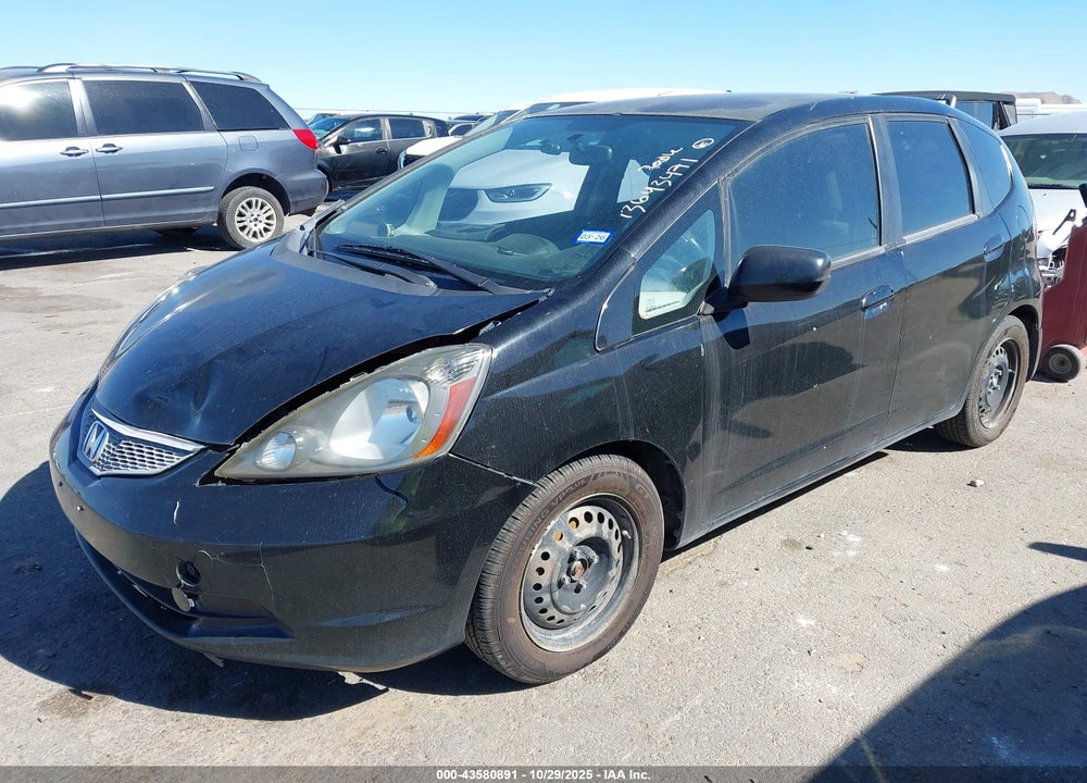 2009 HONDA FIT VIN: JHMGE88209C006833