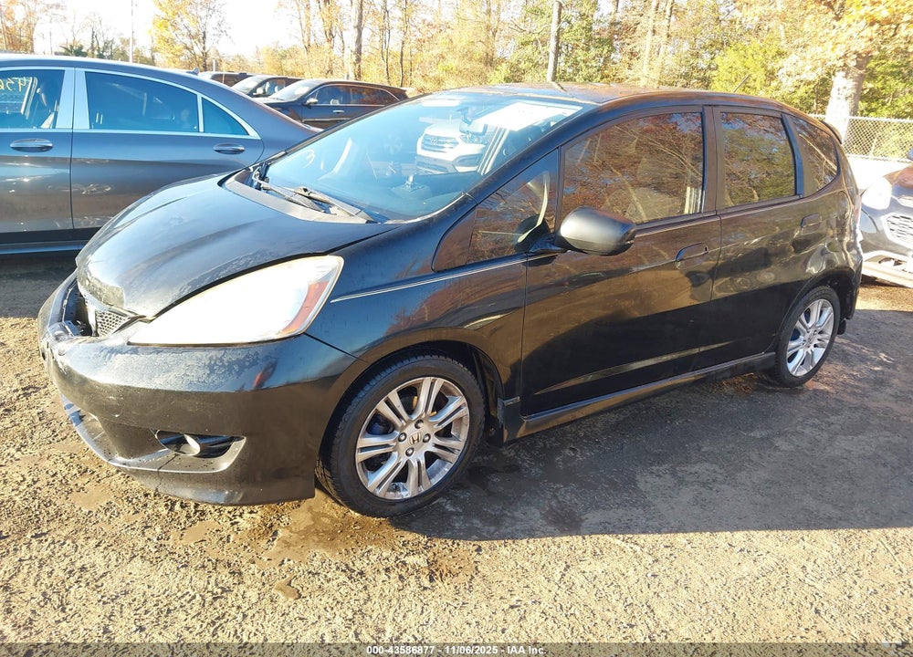 2011 HONDA FIT VIN: JHMGE8H64BC002499