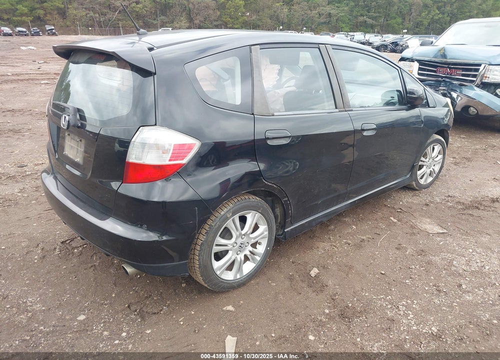2009 HONDA FIT SPORT VIN: JHMGE88409S057904