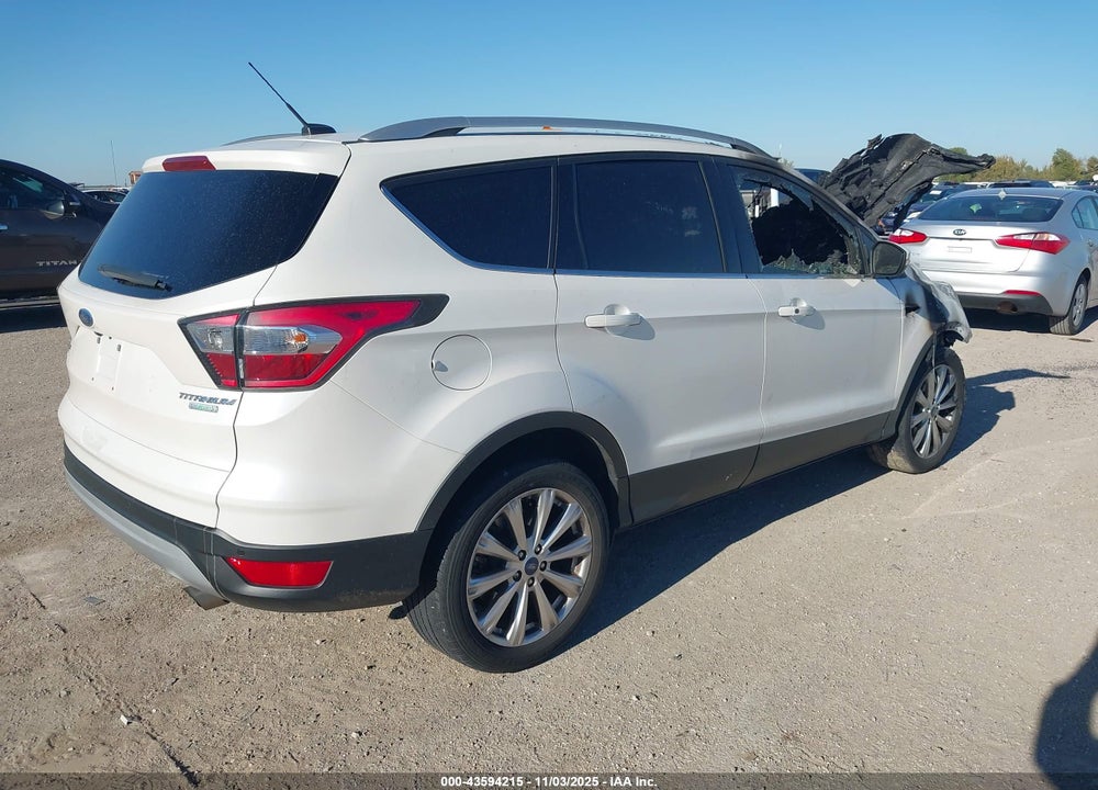2017 FORD ESCAPE TITANIUM VIN: 1FMCU0J99HUA38616