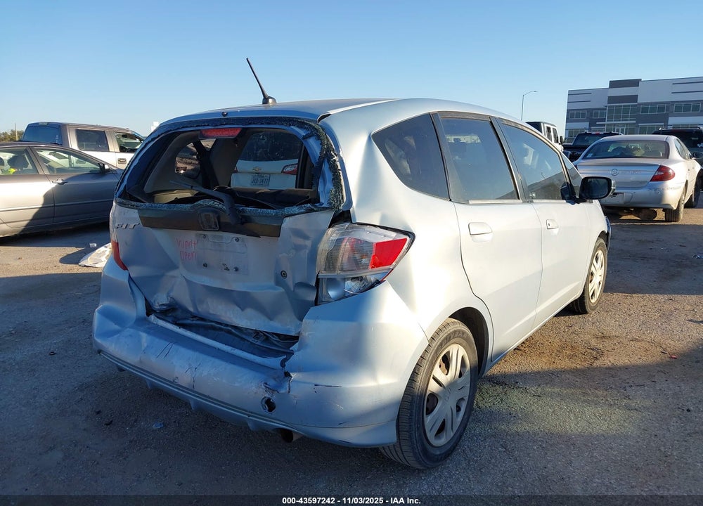 2009 HONDA FIT VIN: JHMGE88239S062769