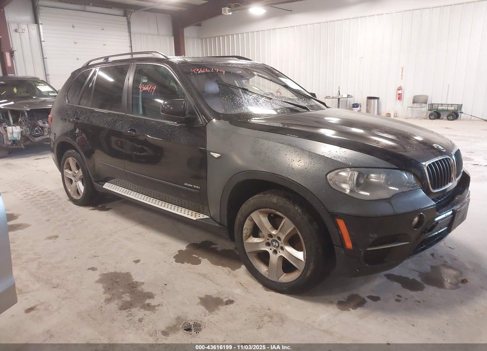 2012 BMW X5 XDRIVE35I/XDRIVE35I PREMIUM/XDRIVE35I SPORT ACTIVITY VIN: 5UXZV4C59CL985973