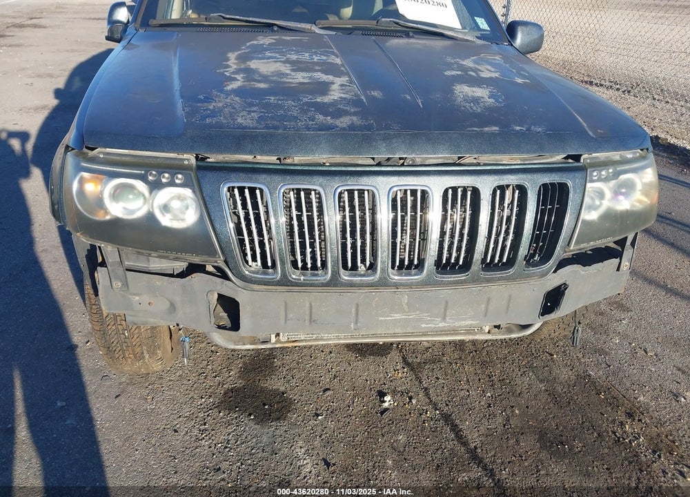 1999 JEEP GRAND CHEROKEE LIMITED VIN: 1J4GW68S0XC676490