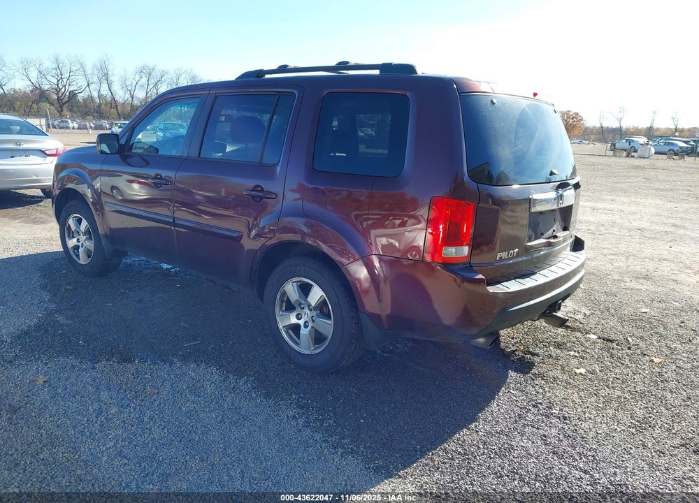 2011 HONDA PILOT EX-L VIN: 5FNYF4H65BB024896