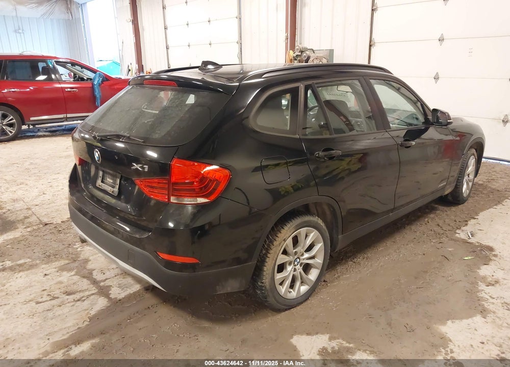 2014 BMW X1 VIN: WBAVL1C51EVY21030