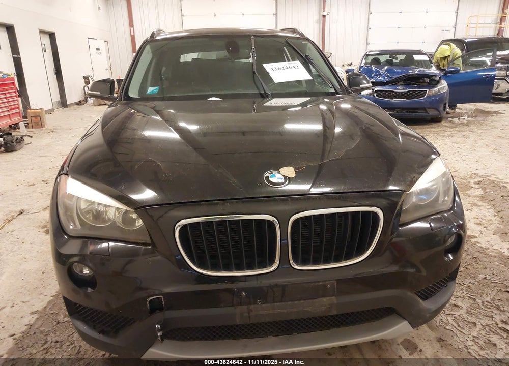 2014 BMW X1 VIN: WBAVL1C51EVY21030