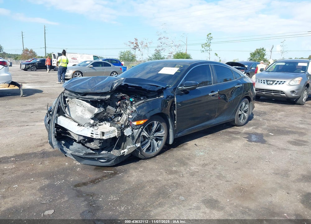 2017 HONDA CIVIC TOURING VIN: 19XFC1F94HE031039
