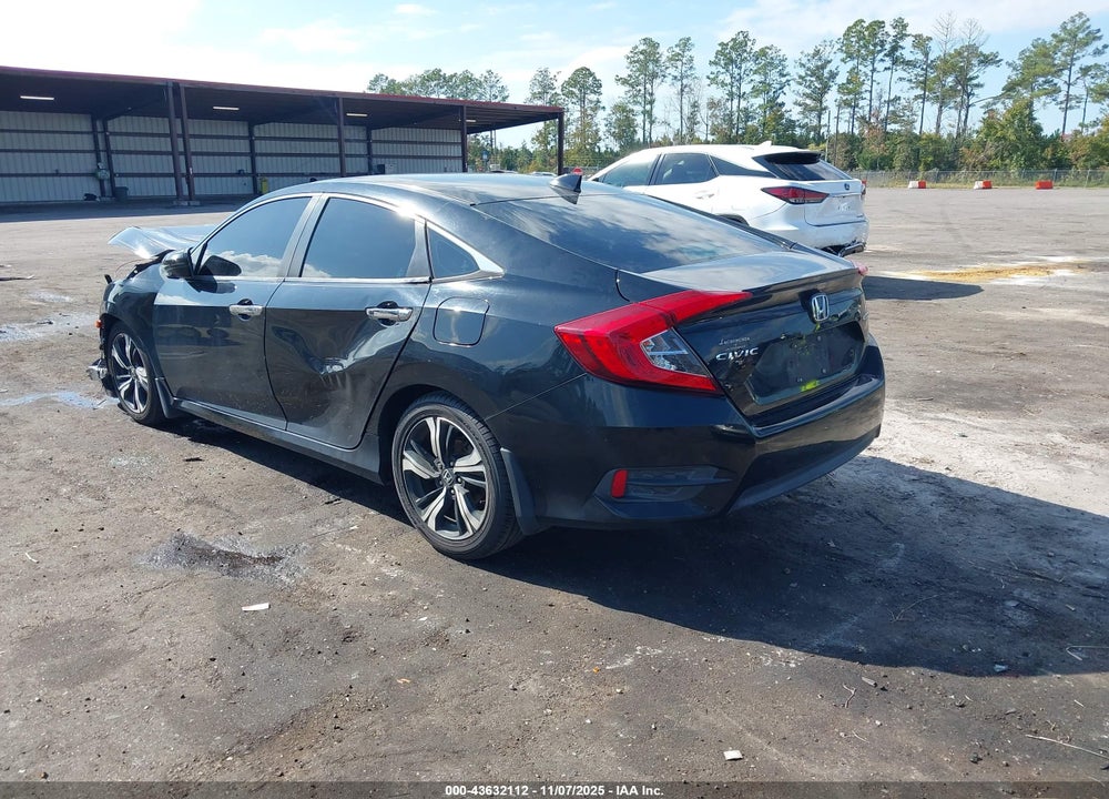 2017 HONDA CIVIC TOURING VIN: 19XFC1F94HE031039