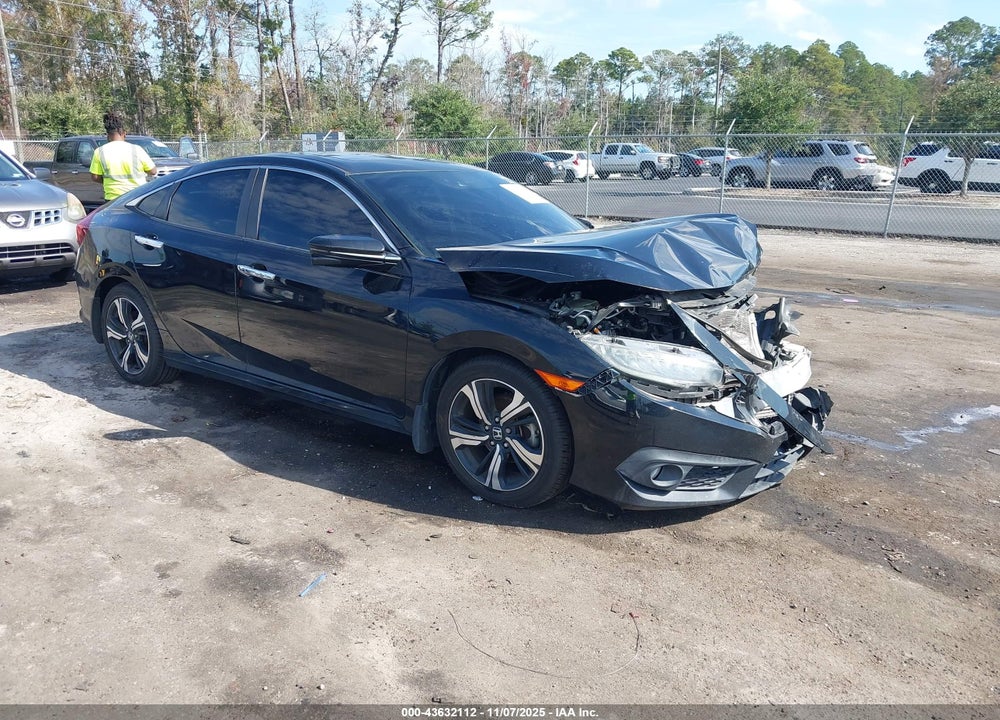 2017 HONDA CIVIC TOURING VIN: 19XFC1F94HE031039