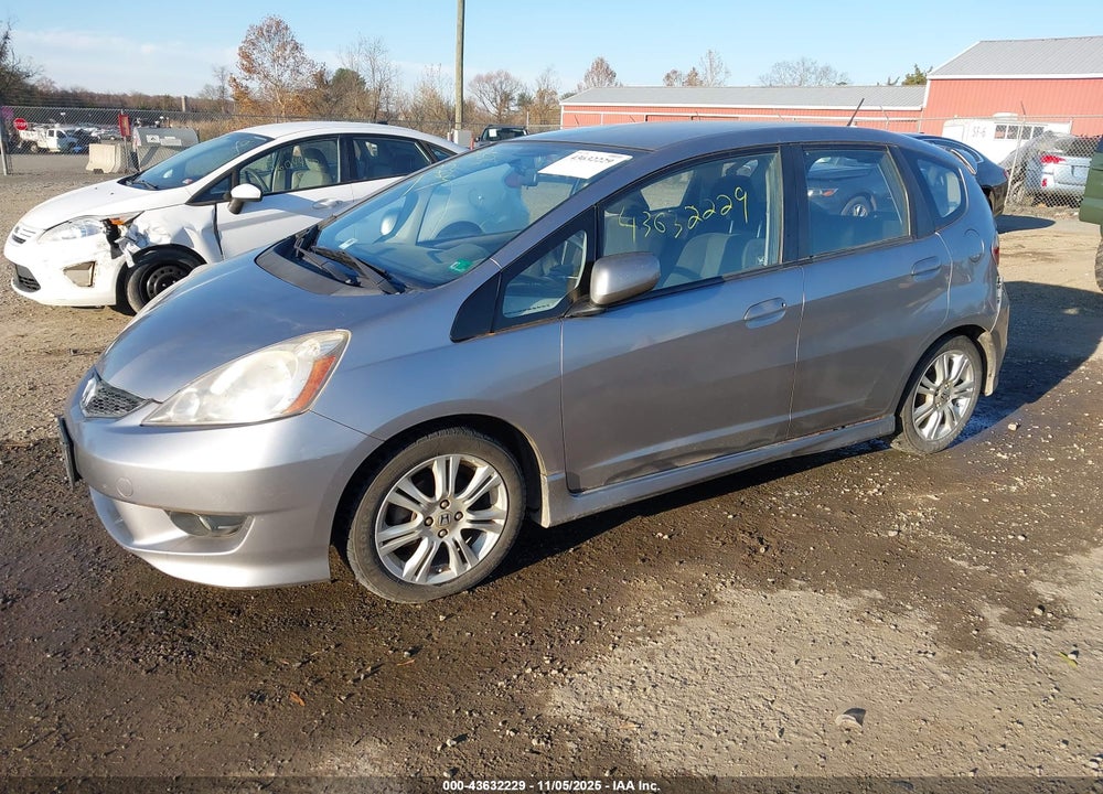 2009 HONDA FIT SPORT VIN: JHMGE88439S001553