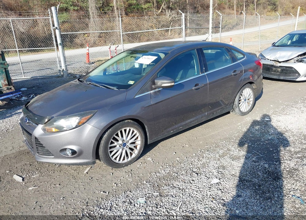 2014 FORD FOCUS TITANIUM VIN: 1FADP3J22EL136933