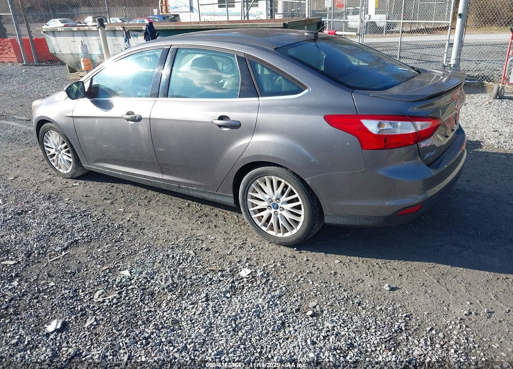 2014 FORD FOCUS TITANIUM VIN: 1FADP3J22EL136933