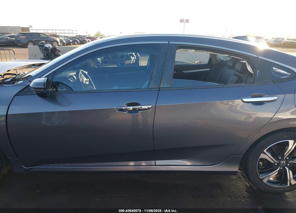 2016 HONDA CIVIC TOURING VIN: 19XFC1F97GE028067