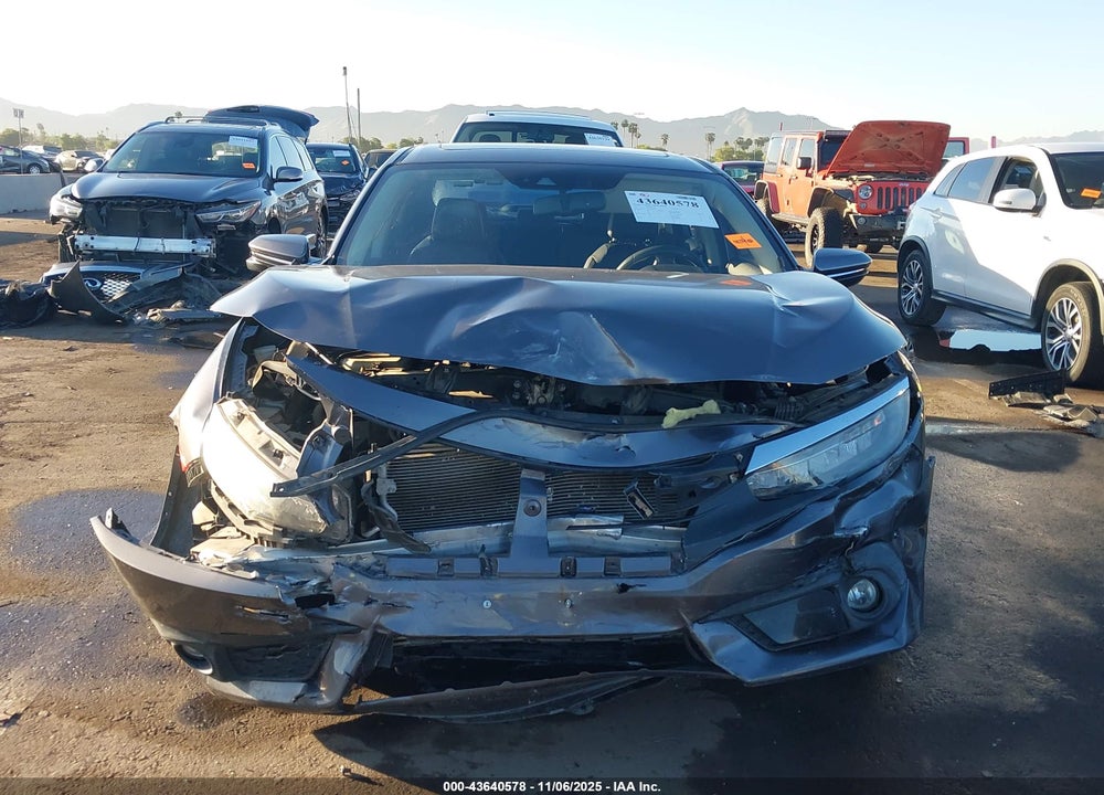 2016 HONDA CIVIC TOURING VIN: 19XFC1F97GE028067
