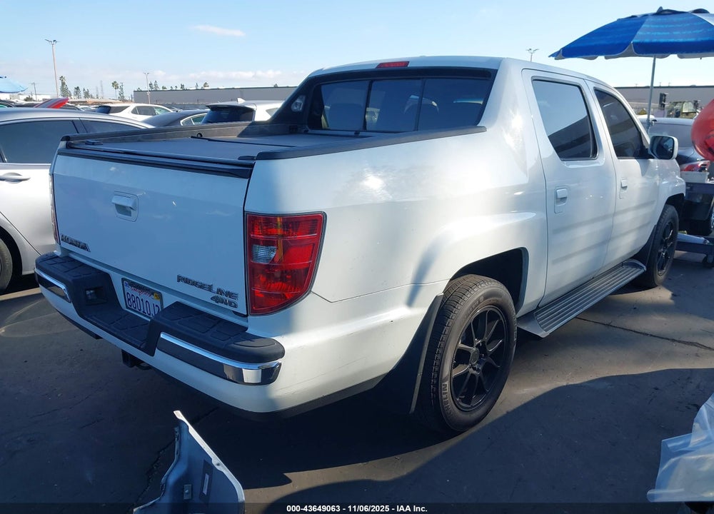 2011 HONDA RIDGELINE RTL VIN: 5FPYK1F52BB002415