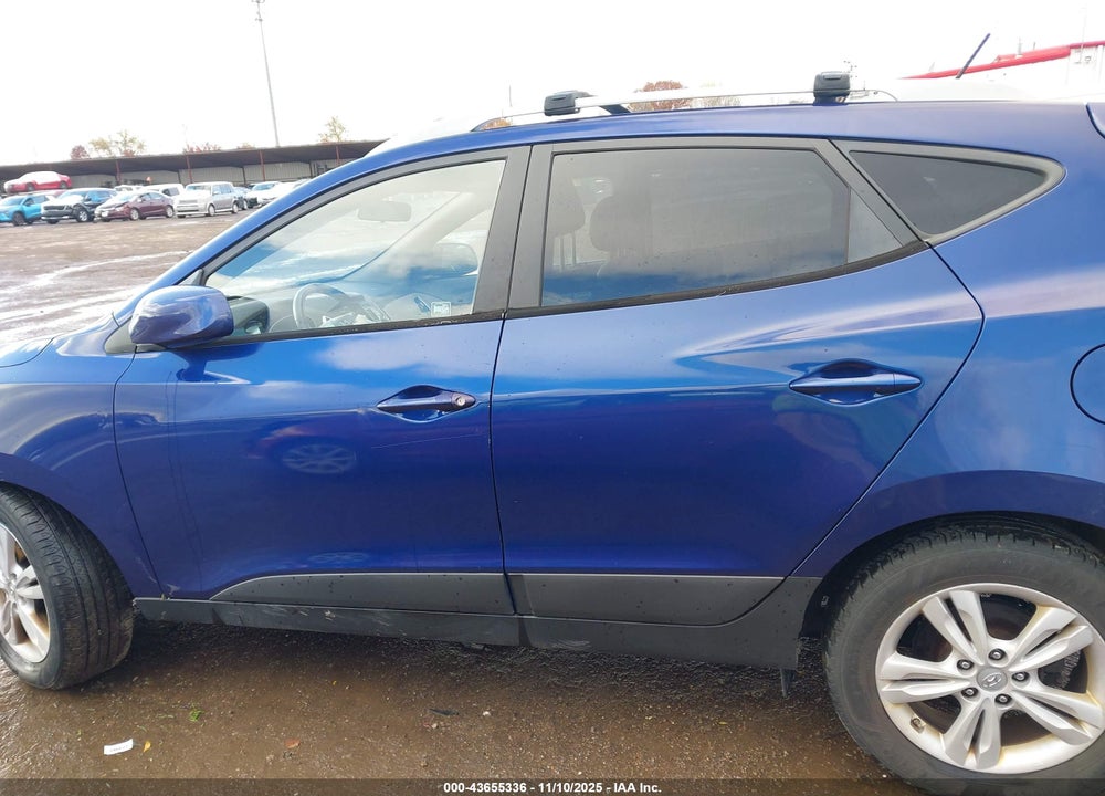 2011 HYUNDAI TUCSON VIN: KM8JUCAC0BU214206