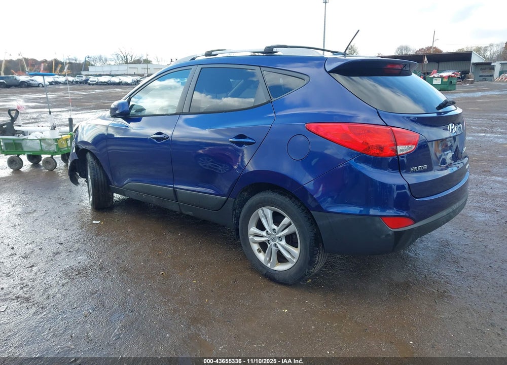 2011 HYUNDAI TUCSON VIN: KM8JUCAC0BU214206
