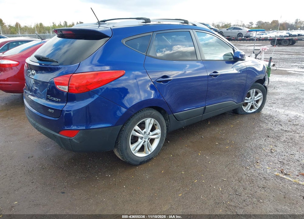 2011 HYUNDAI TUCSON VIN: KM8JUCAC0BU214206
