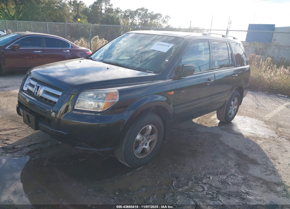2007 HONDA PILOT EX-L VIN: 5FNYF28527B045059