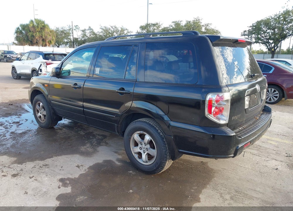 2007 HONDA PILOT EX-L VIN: 5FNYF28527B045059