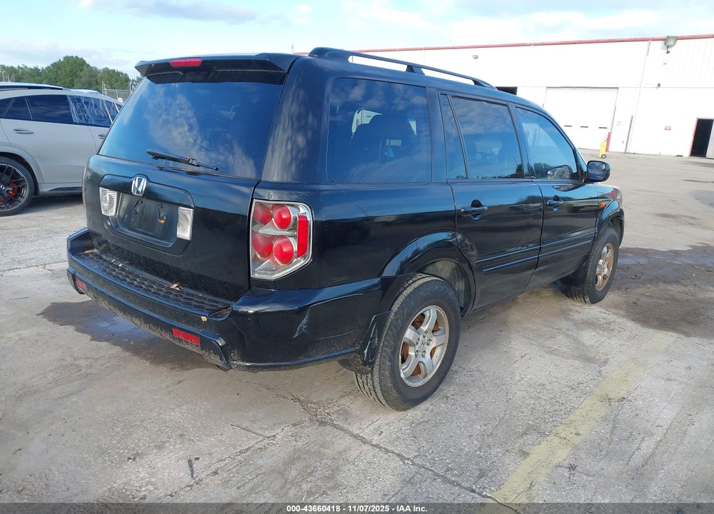 2007 HONDA PILOT EX-L VIN: 5FNYF28527B045059