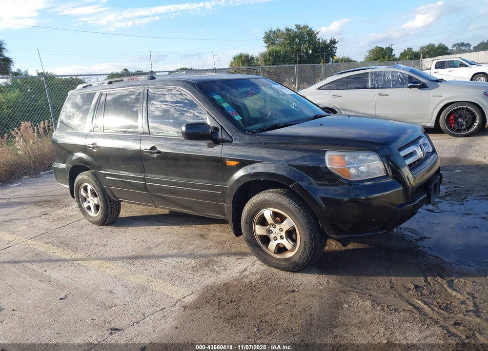 2007 HONDA PILOT EX-L VIN: 5FNYF28527B045059