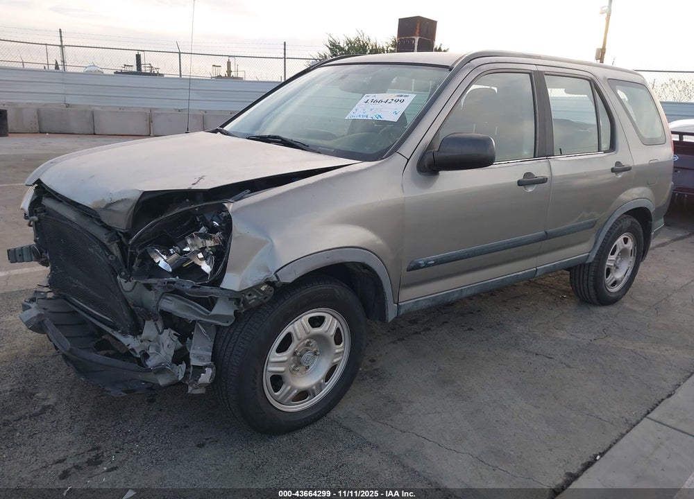 2005 HONDA CR-V LX VIN: JHLRD68575C009057