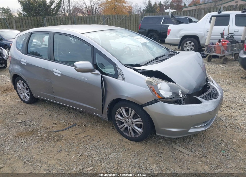 2009 HONDA FIT VIN: JHMGE88239S000658