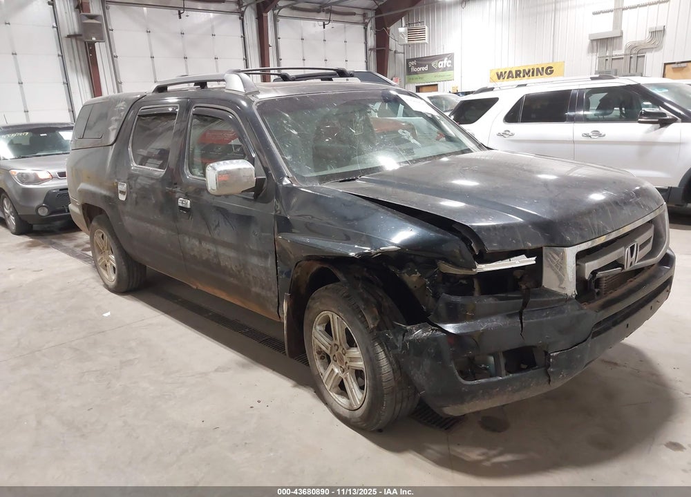 2011 HONDA RIDGELINE RTL VIN: 5FPYK1F56BB454402