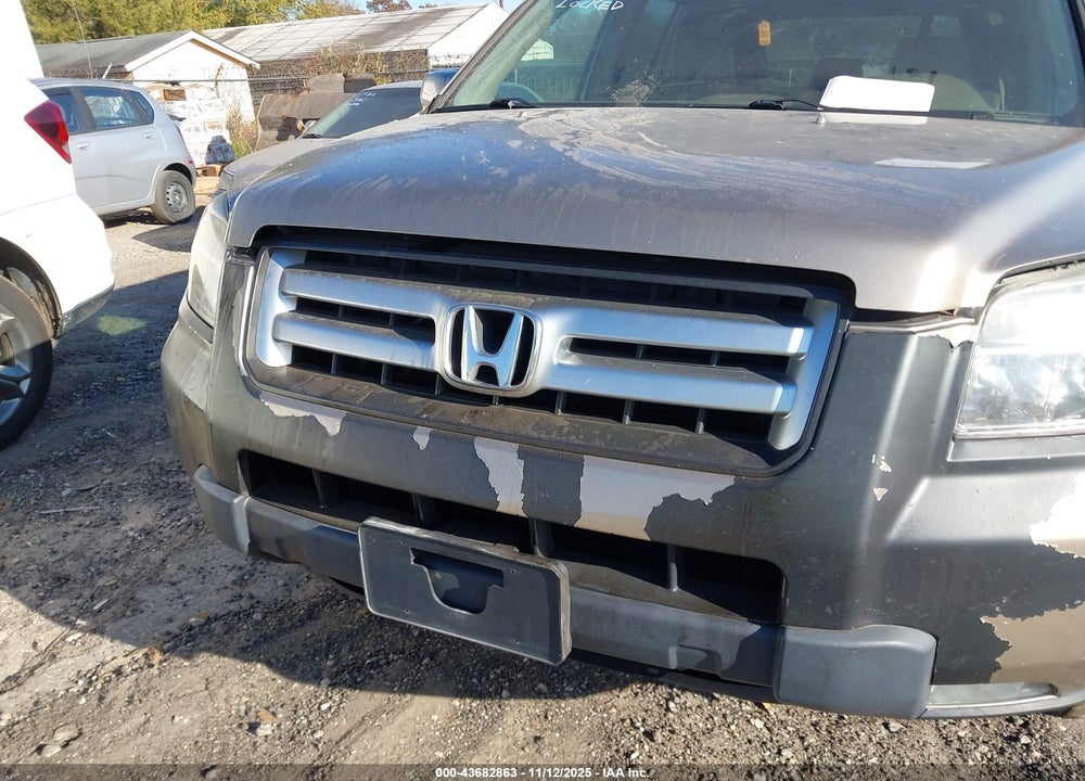 2006 HONDA PILOT EX-L VIN: 5FNYF285X6B044031