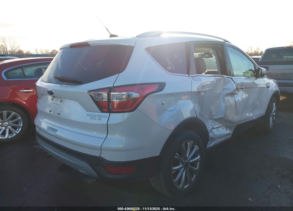 2017 FORD ESCAPE TITANIUM VIN: 1FMCU0J94HUA64850