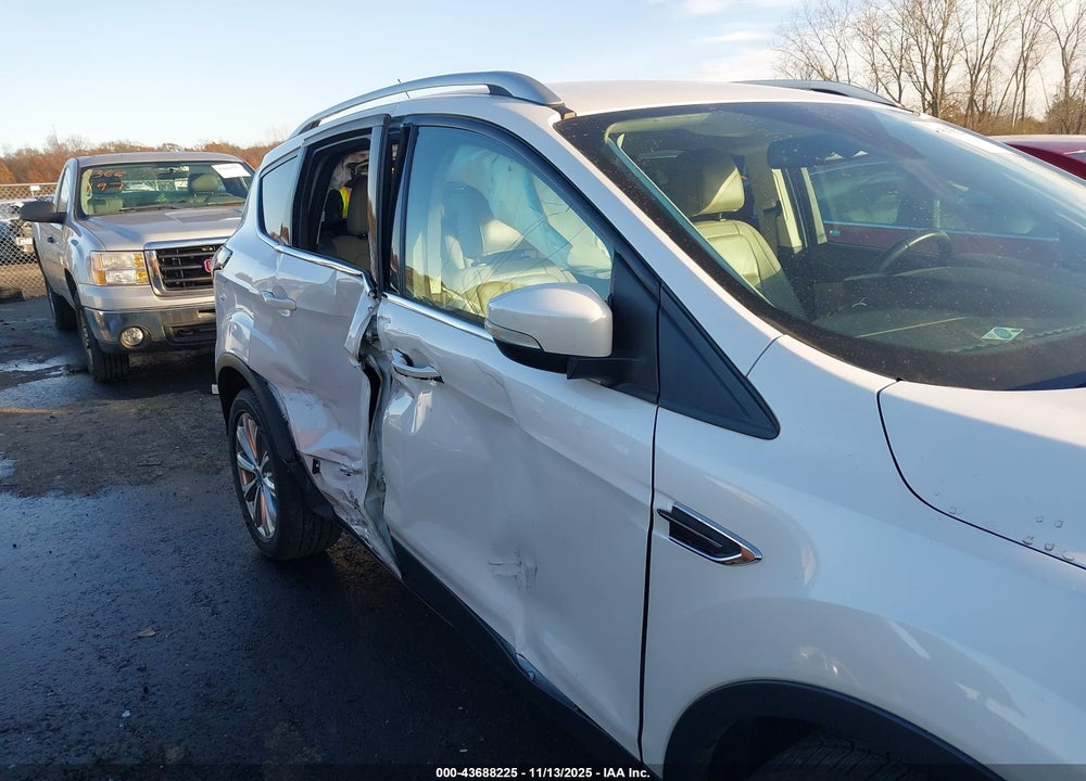 2017 FORD ESCAPE TITANIUM VIN: 1FMCU0J94HUA64850