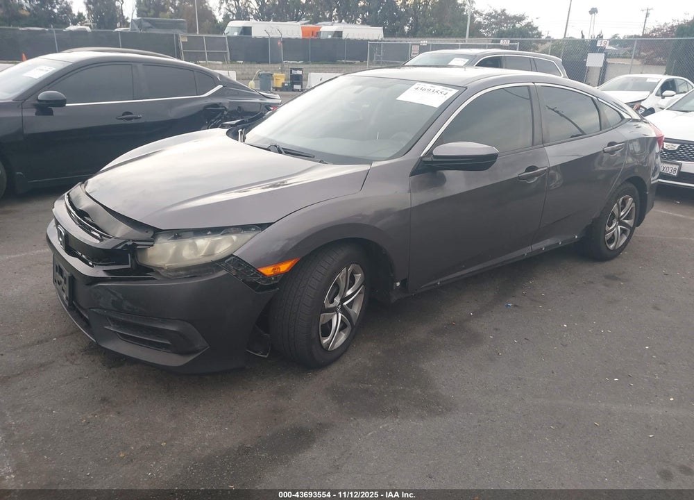 2017 HONDA CIVIC LX VIN: 2HGFC2F57HH518017
