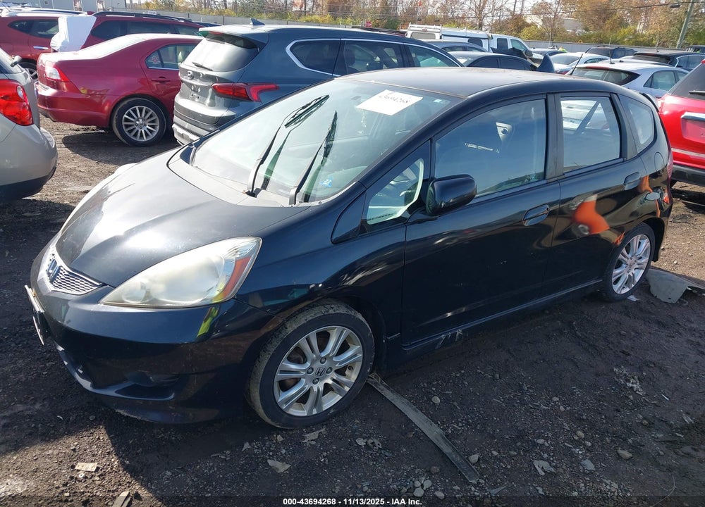 2009 HONDA FIT SPORT VIN: JHMGE88489S003718